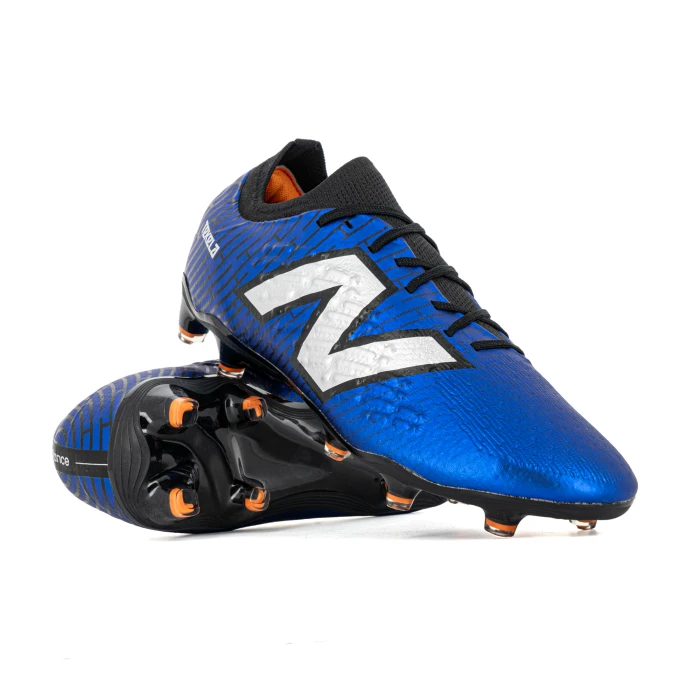 New Balance - Tekela Magia Low FG V4+ Power Surge Pack